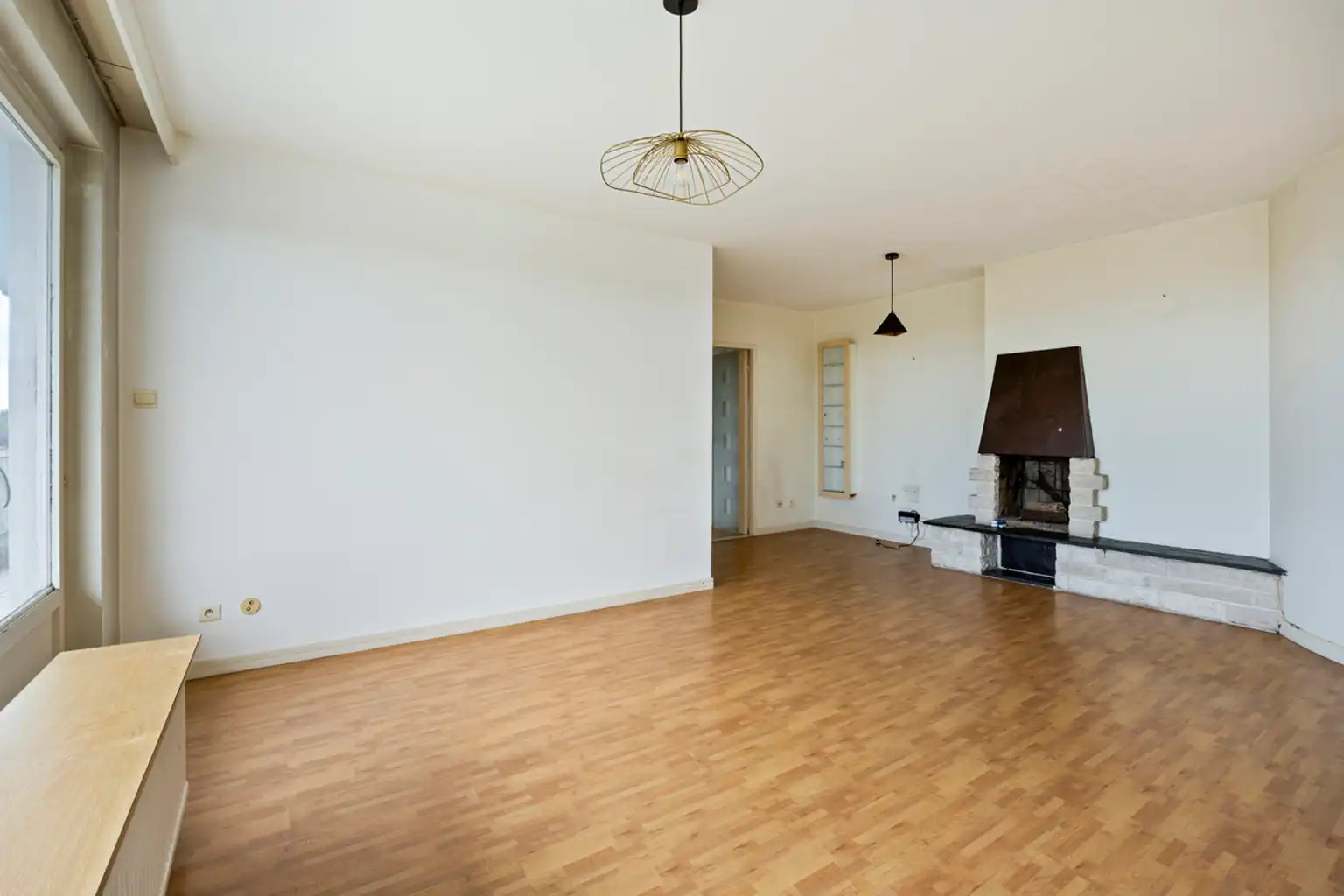 Lichtrijk appartement met open zicht, op te frissen foto 5