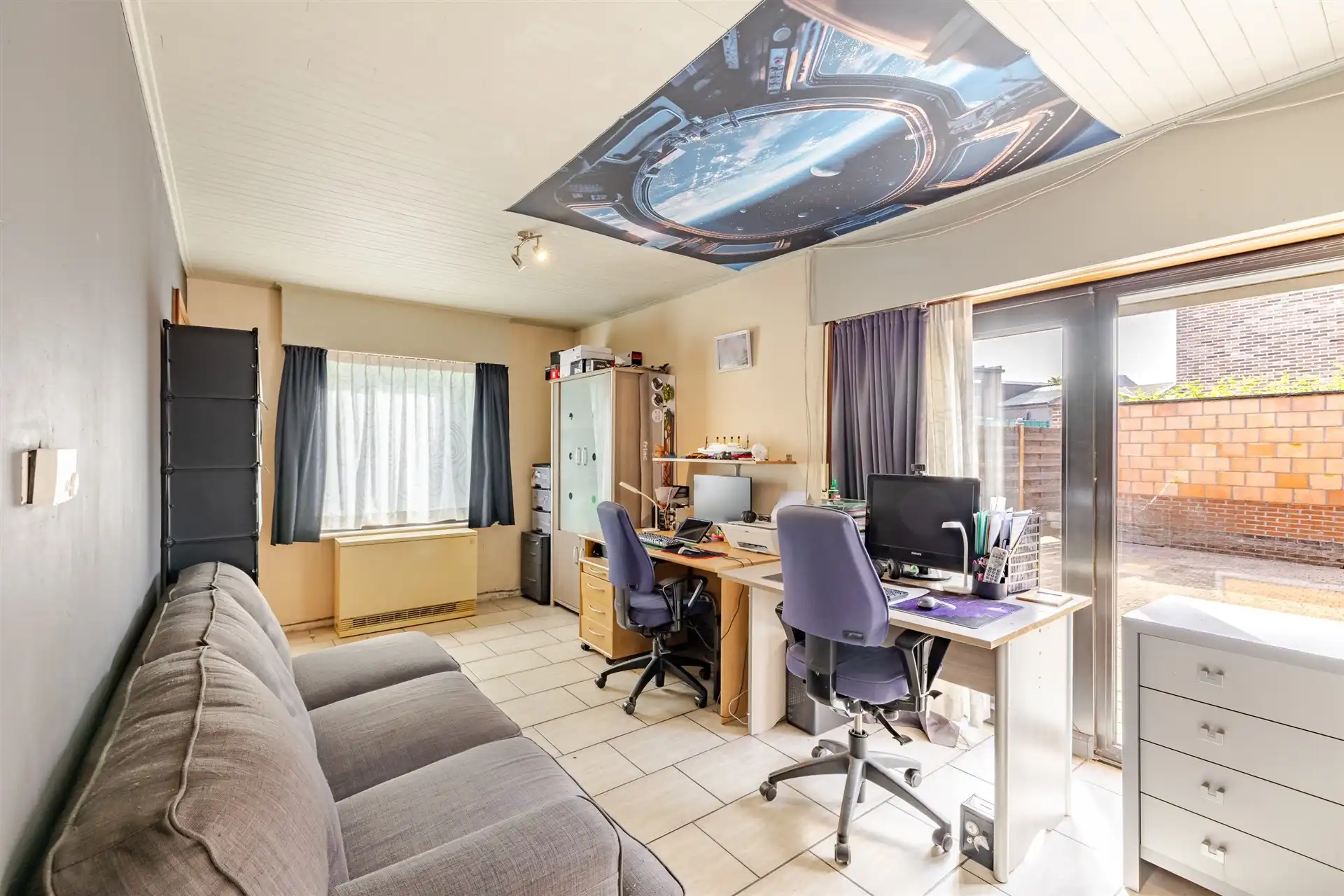 Te renoveren woning met garage en polyvalente ruimte foto 5