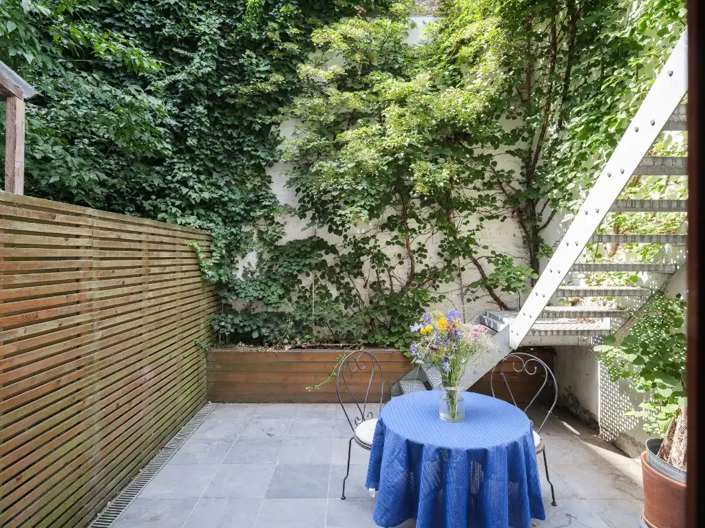 Architecturale gezinswoning met drie slaapkamers, zicht op water en groen, vlak bij de Coupure. foto 6