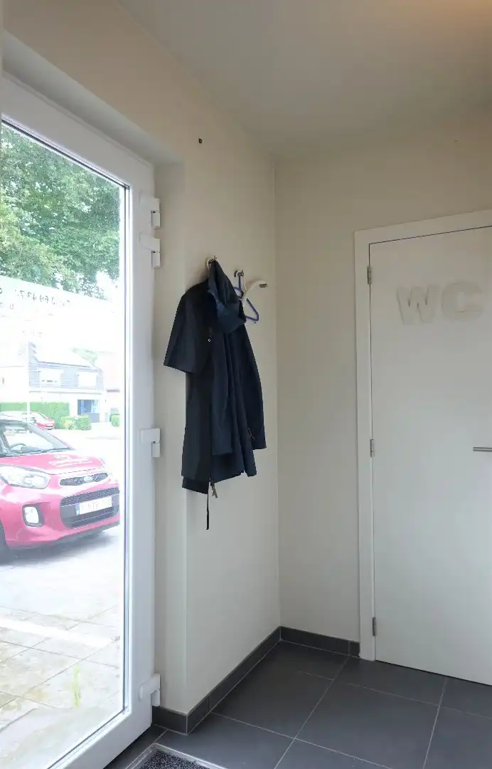Ruim gelijkvloers appartement met koertje  foto 15