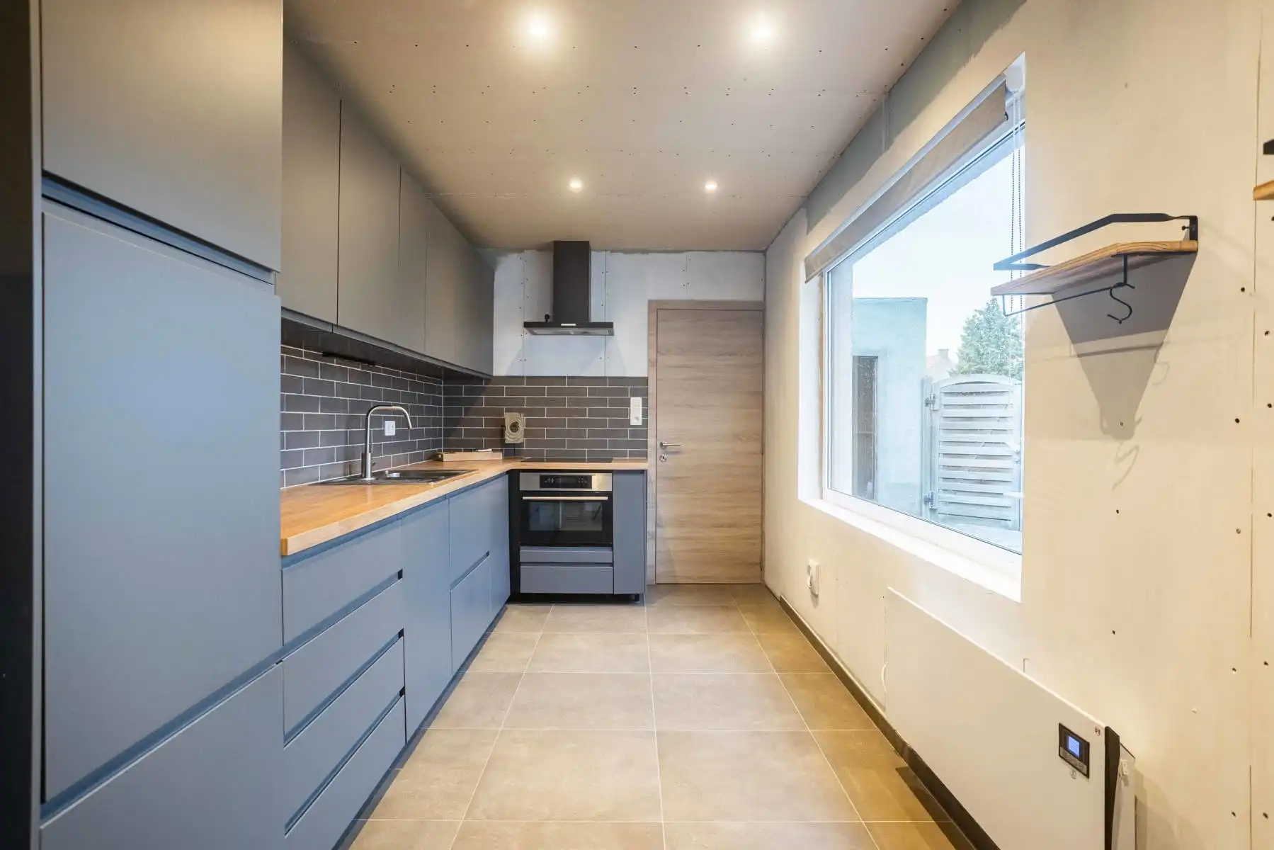 Goed gelegen halfopen bebouwing te Burst foto 4