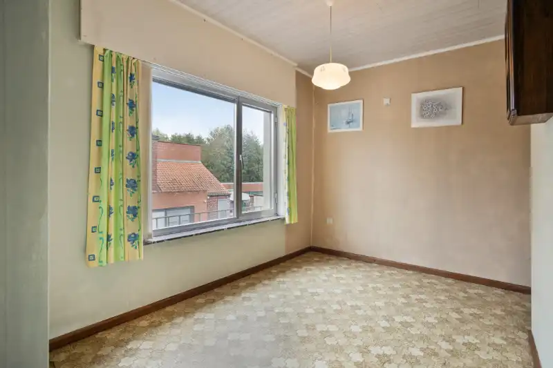 HALFOPEN BEBOUWING MET VEEL RENOVATIEPOTENTIEEL EN RUIM DAKTERRAS foto 21
