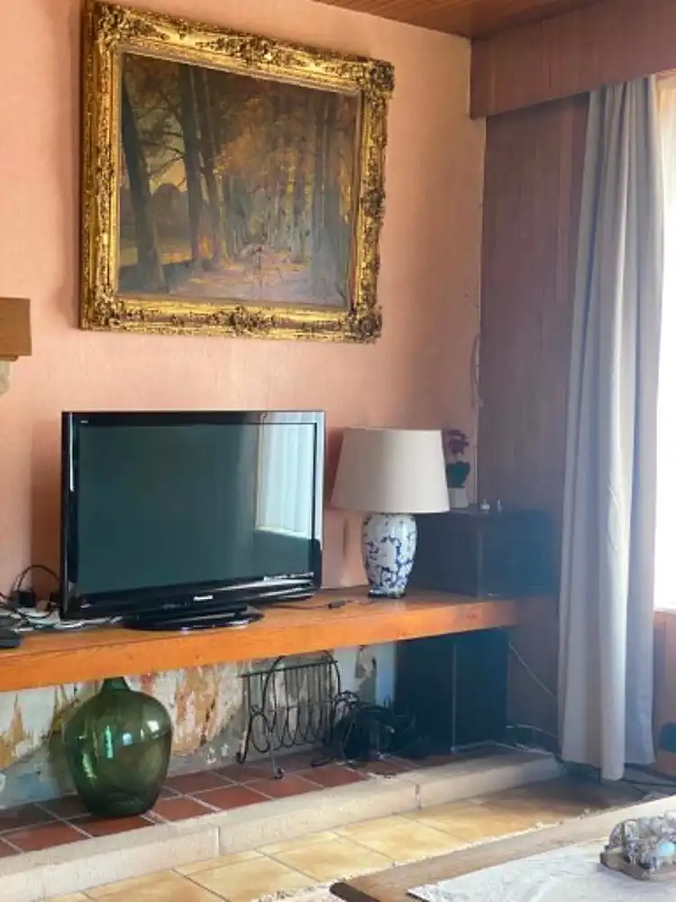 Charmante 3-gevelwoning met 2 slaapkamers, ruime zolder en tal van mogelijkheden foto 2