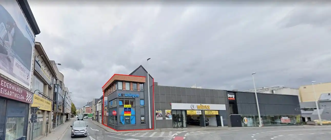 Uitzonderlijk hoekpand: modern commercieel gebouw op strategische zichtlocatie in Aalst foto {{pictureIndex}}