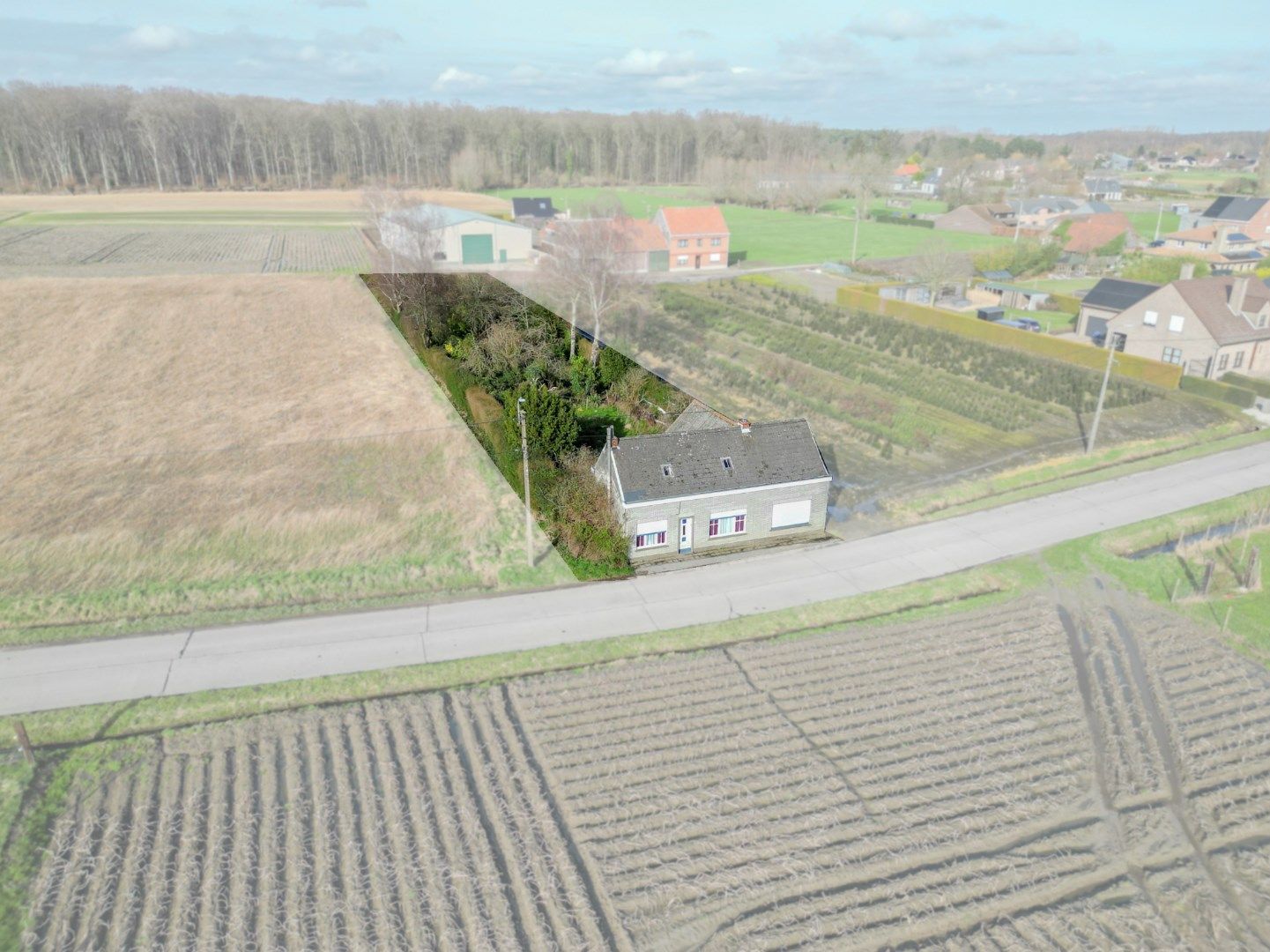 Bouwgrond voor open bebouwing op 1363m² te Oordegem foto {{pictureIndex}}