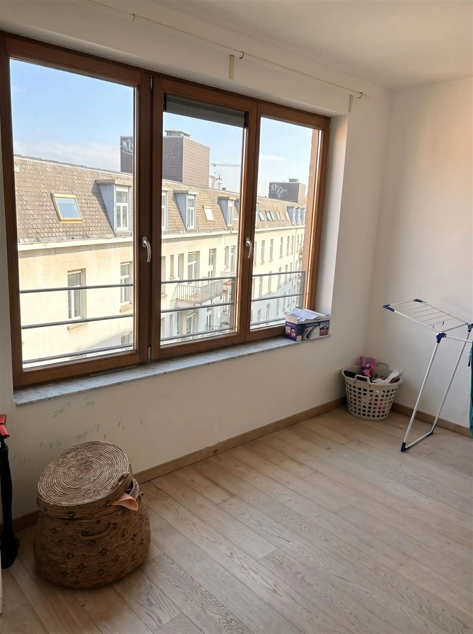 Ruim licht appartement met zicht op skyline van Brussel  foto 7