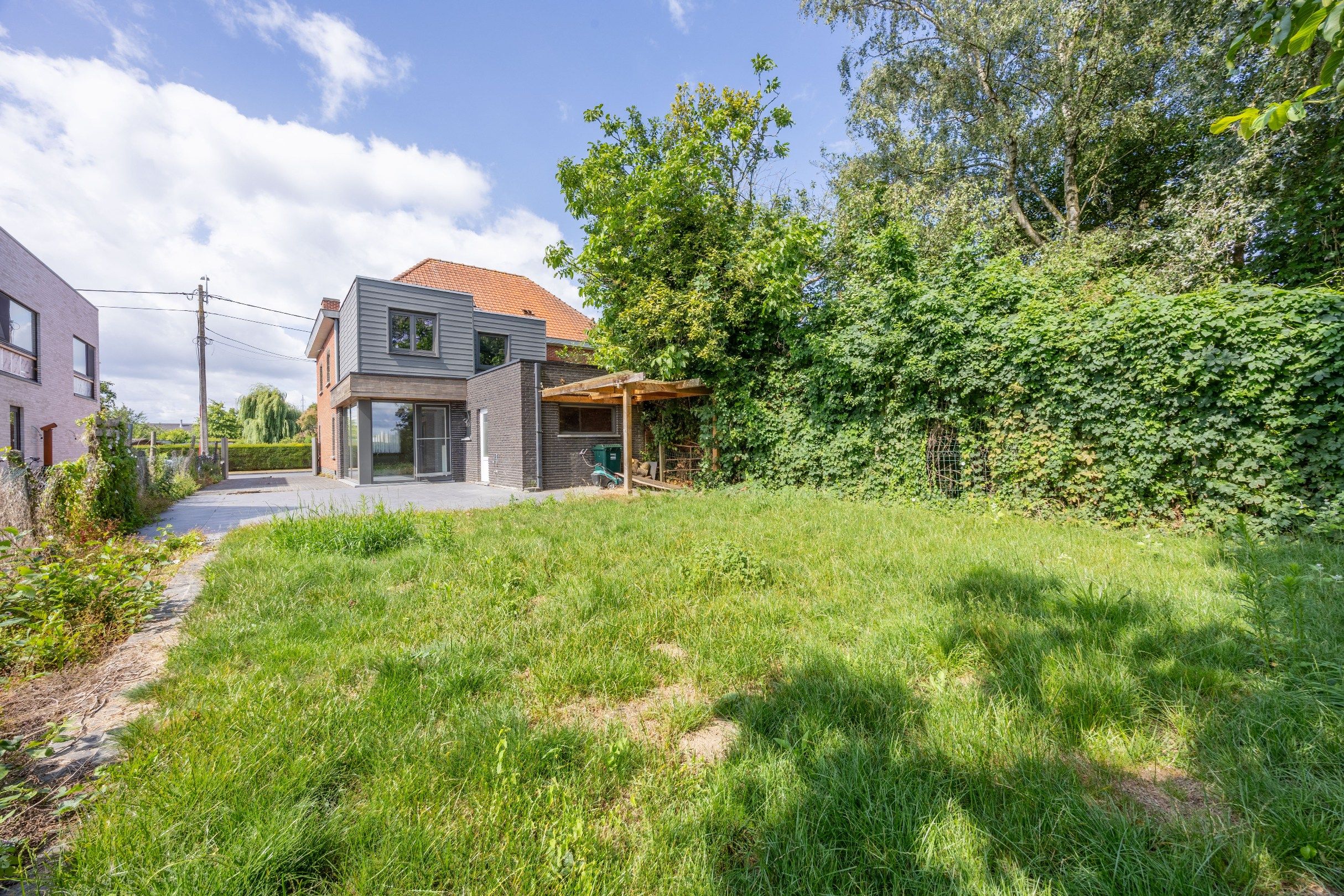 Halfopen woning op TOPLOCATIE met zicht op groen.  foto 21