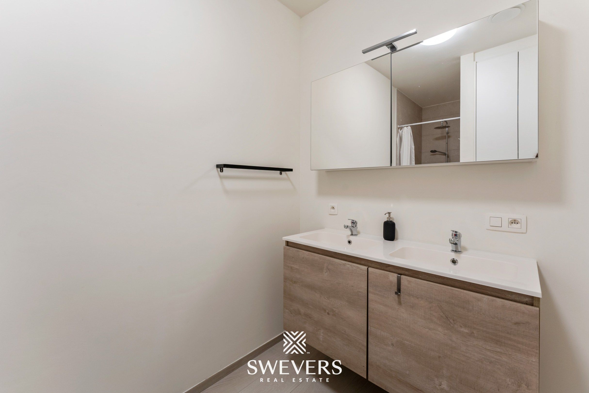 Instapklaar, energiezuinig gelijkvloers appartement (99 m²) met garage en kelders in het pittoreske Bolderberg foto 17