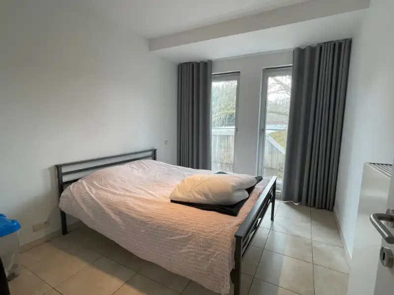 Instapklaar modern appartement met 2 slaapkamers en garage foto 15