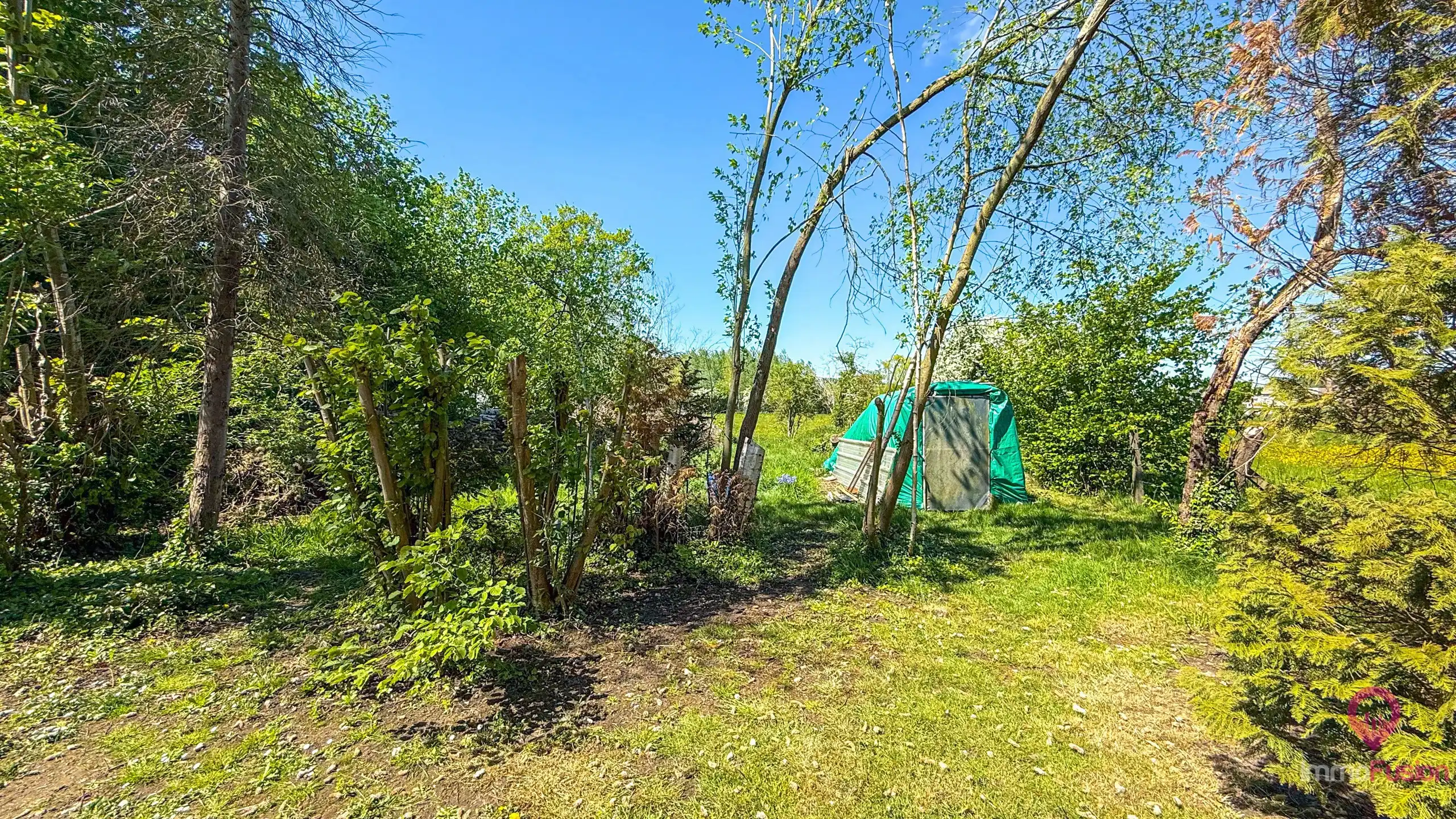 Te renoveren woning met 3 slpkms op ruim perceel van 8a58ca! foto 30
