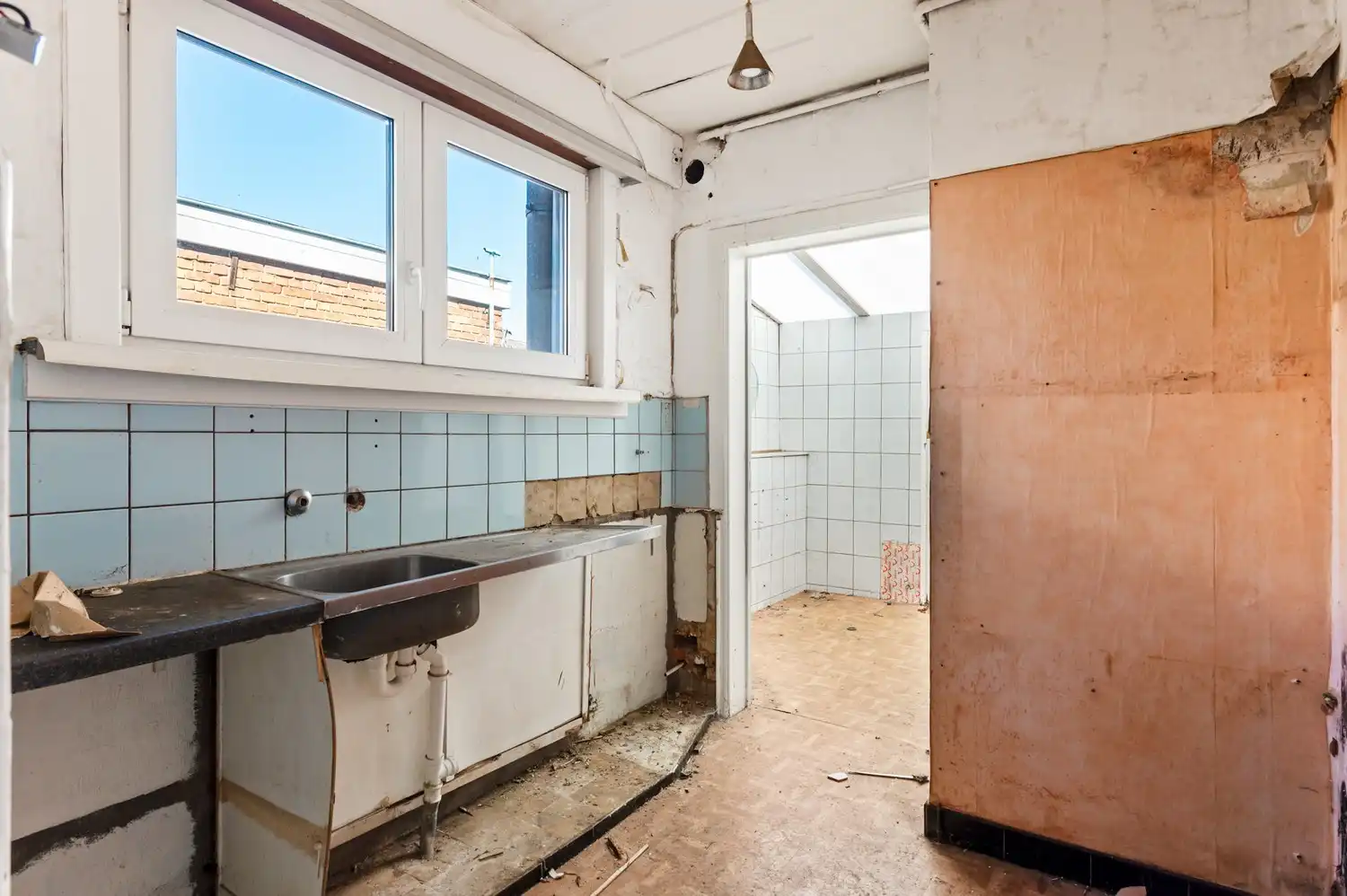 Handelsgelijkvloers met bovenliggend appartement in het centrum van Wommelgem! foto 16