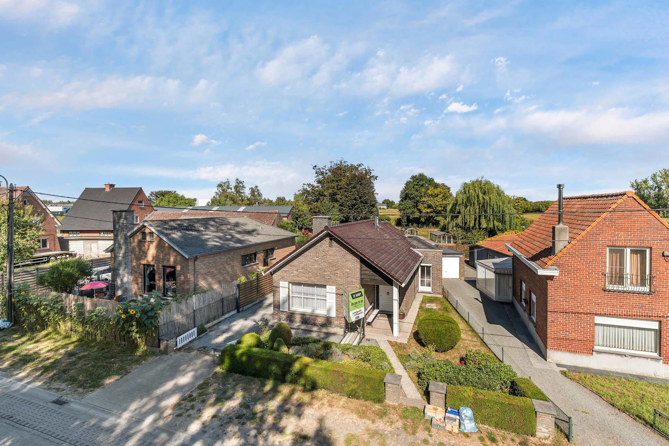 Te renoveren bungalow met aparte woonunit op topligging foto 14