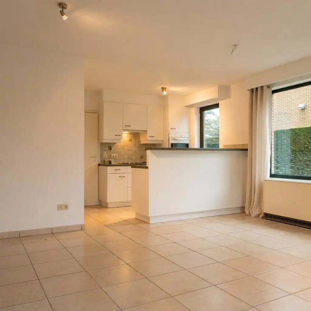 Gezellig gelijkvloersappartement met zonnige tuin en garage foto 3