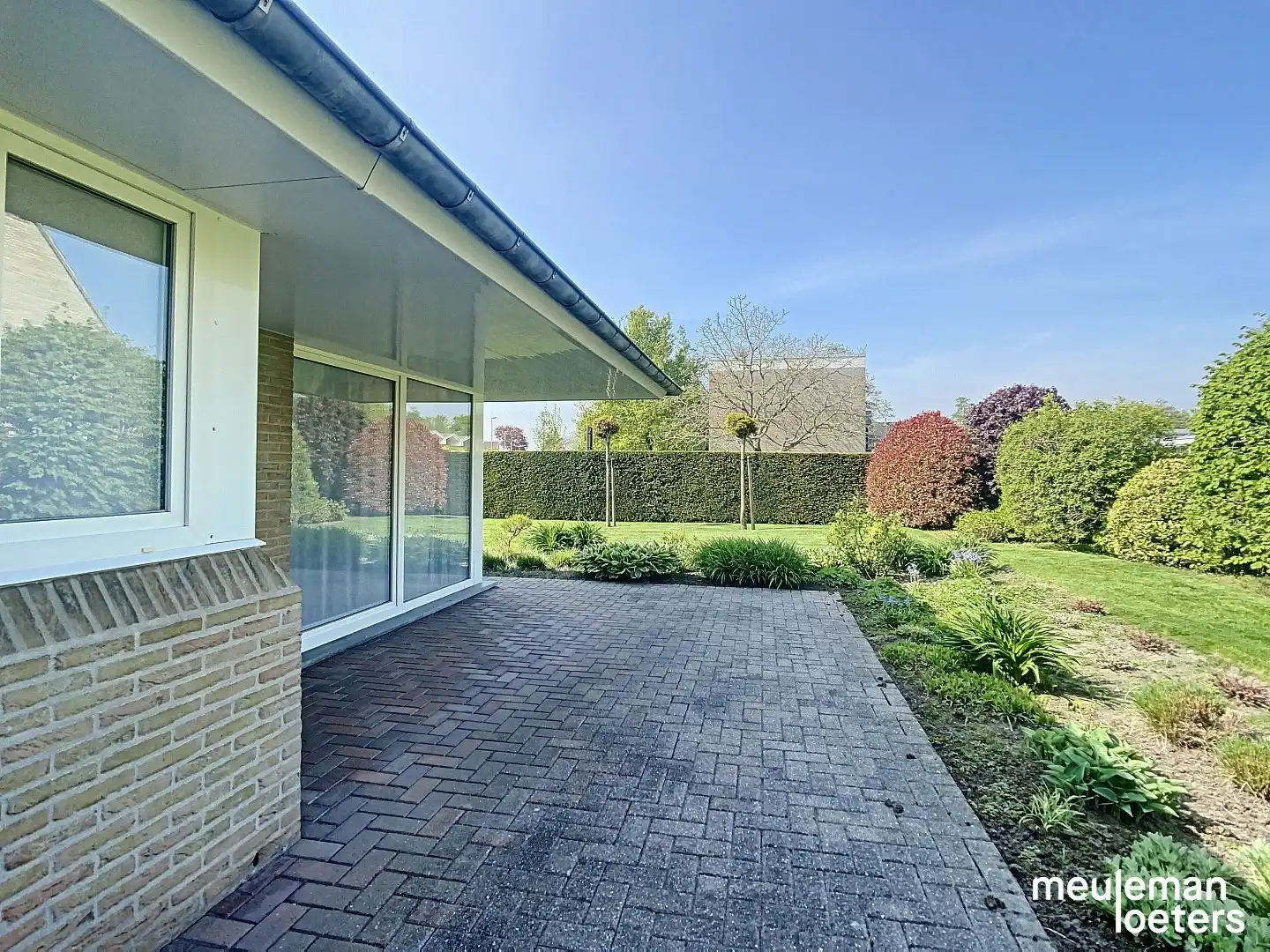 Schitterend gelegen en energiezuinige gelijkvloerse woning met tuin en garage foto 16
