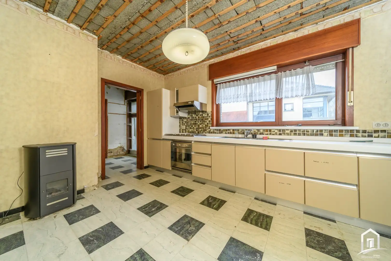 bungalow met achterliggende bouwgrond in het groene Hofstade foto 8