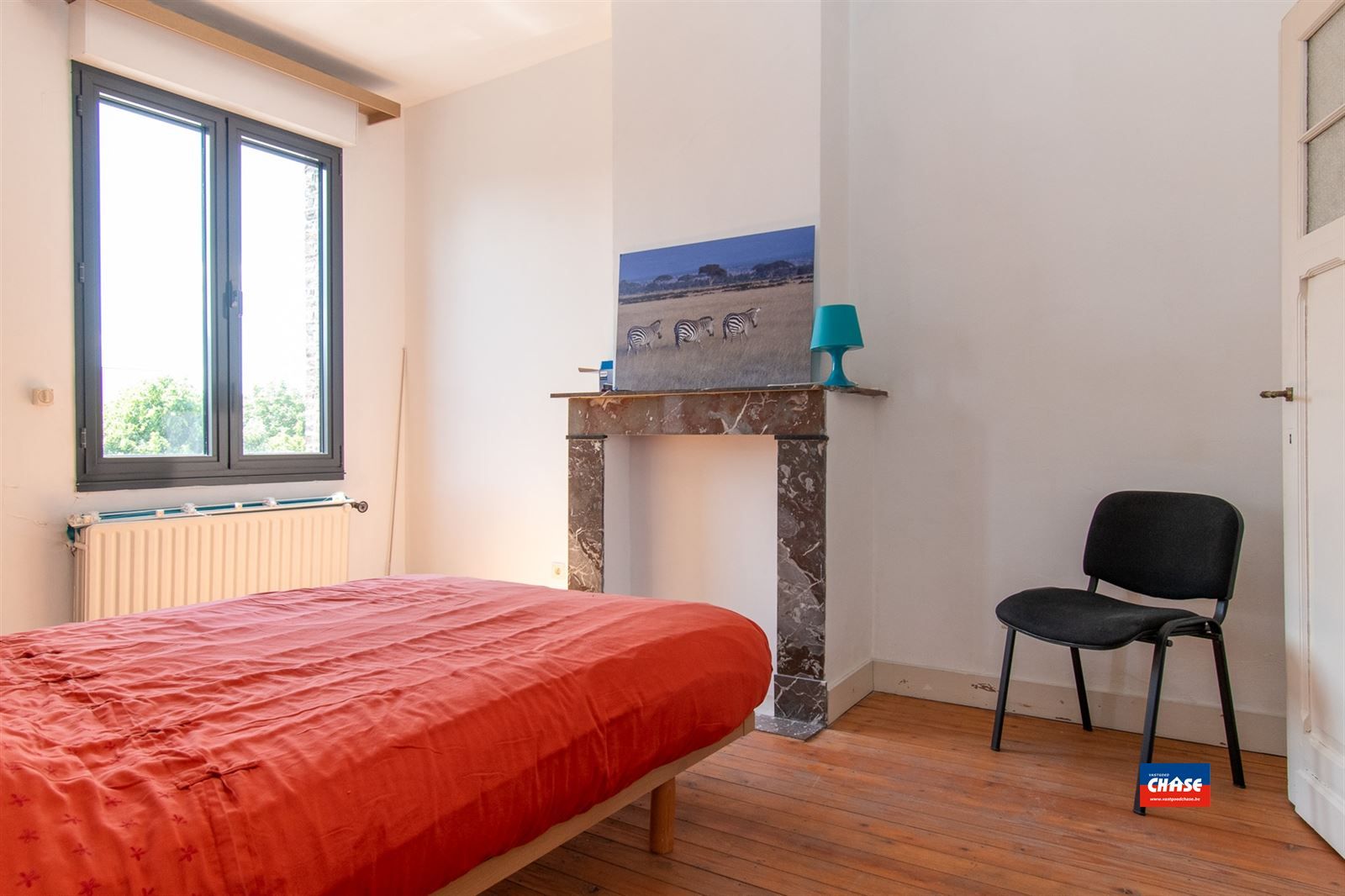 Karaktervolle burgerwoning met 4 ruime slaapkamers en stadstuin foto 21
