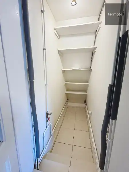 Knusse rijwoning foto 8