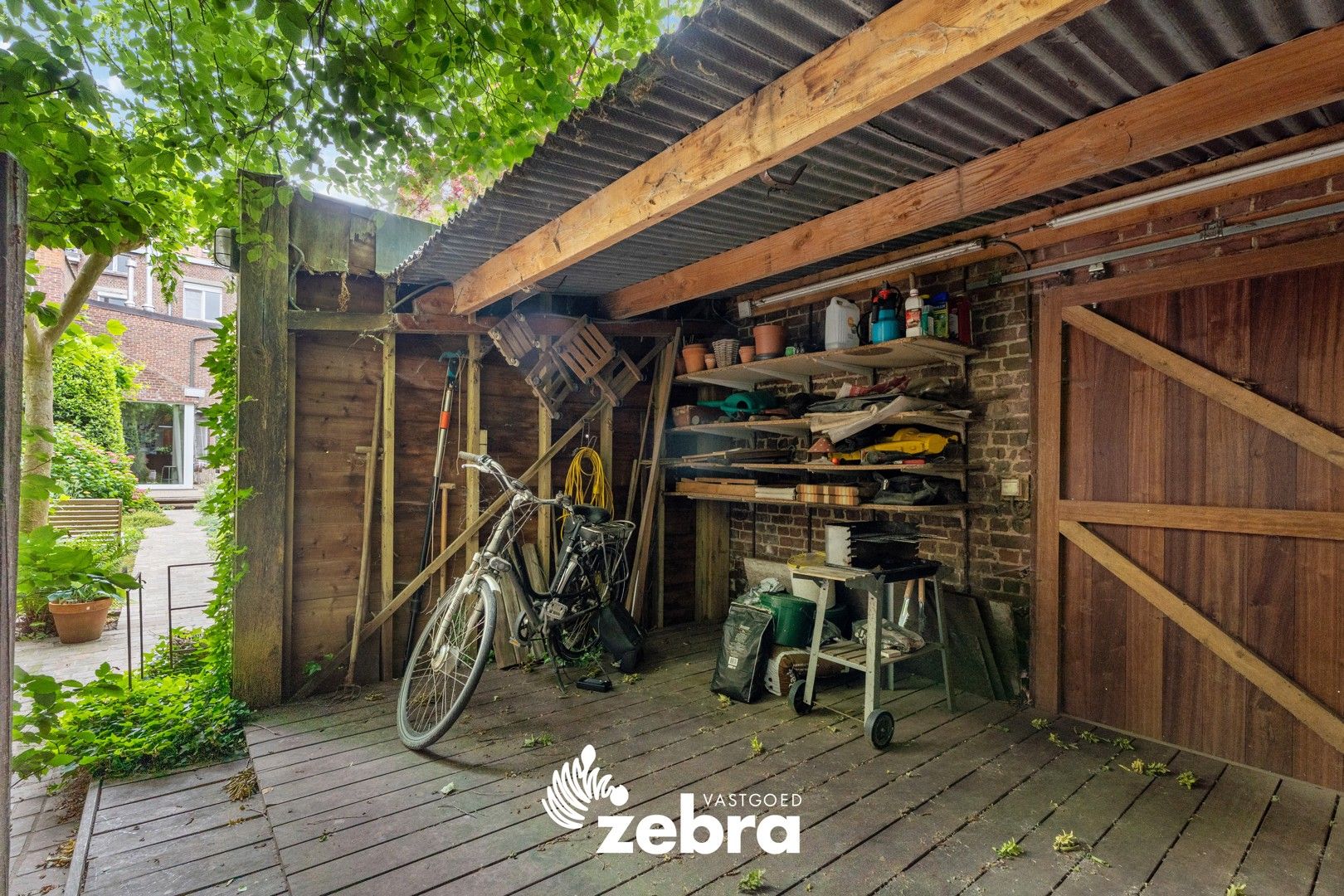 Karaktervolle herenwoning met ruime tuin in hartje Roeselare! foto 34