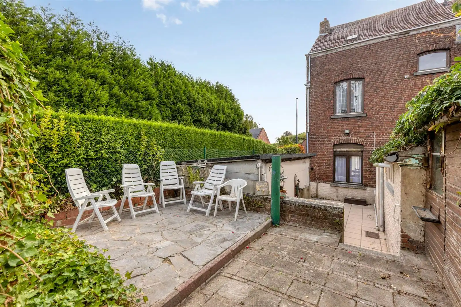 Te renoveren 3-gevelwoning met mogelijks 4 slaapkamers + garage foto 3