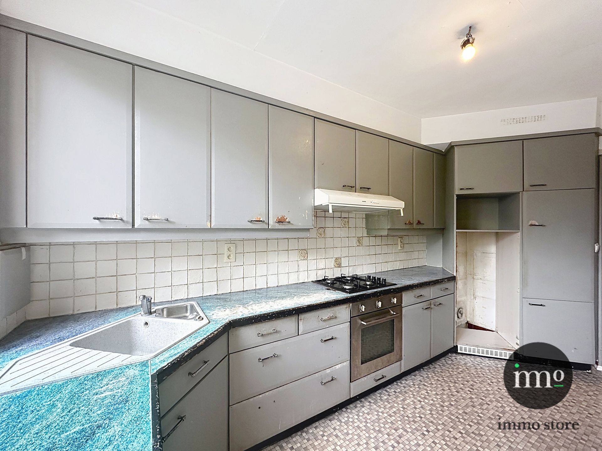 Goedgelegen rijwoning met 3, mogelijks 4 slaapkamers en tuin foto 8