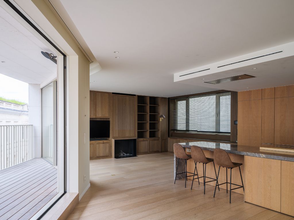 Luxueus tweeslaapkamerappartement met ruim terras en centrale ligging aan de Kouter. foto {{pictureIndex}}