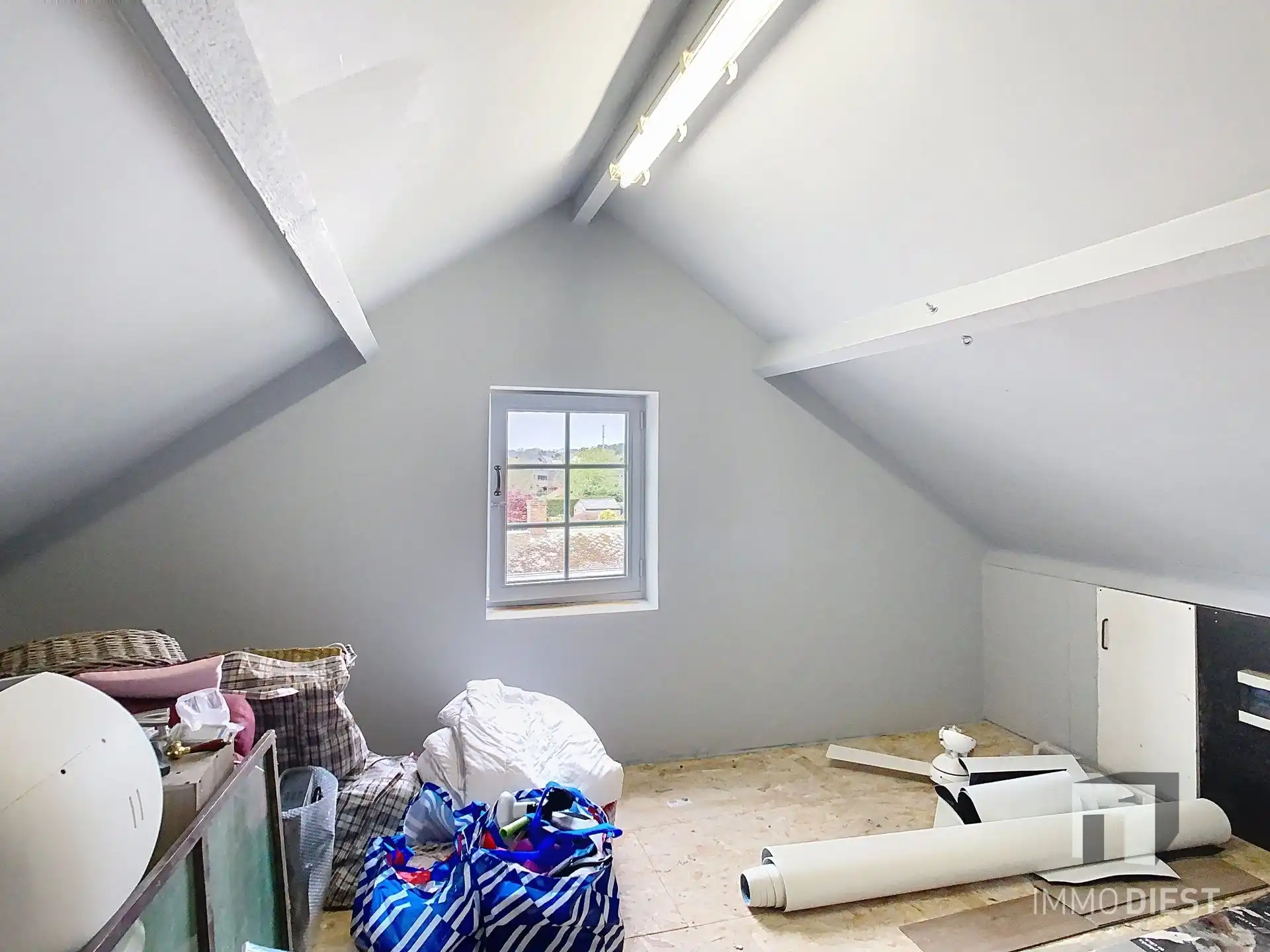 Charmante, op te frissen woning met ruime tuin nabij het centrum van Herselt. foto 24