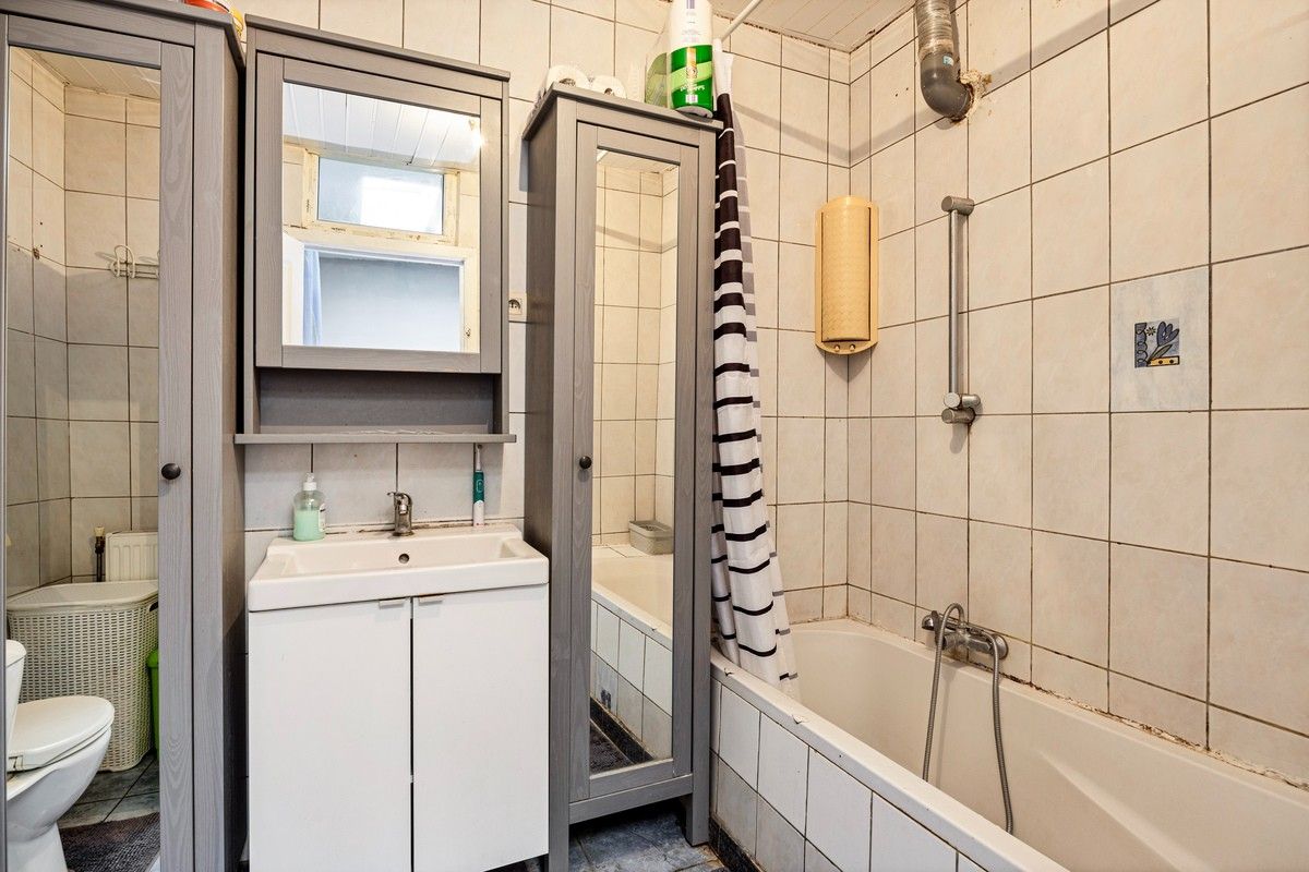 Op te frissen woning met 3 slaapkamers en tuintje vlakbij het centrum foto 9