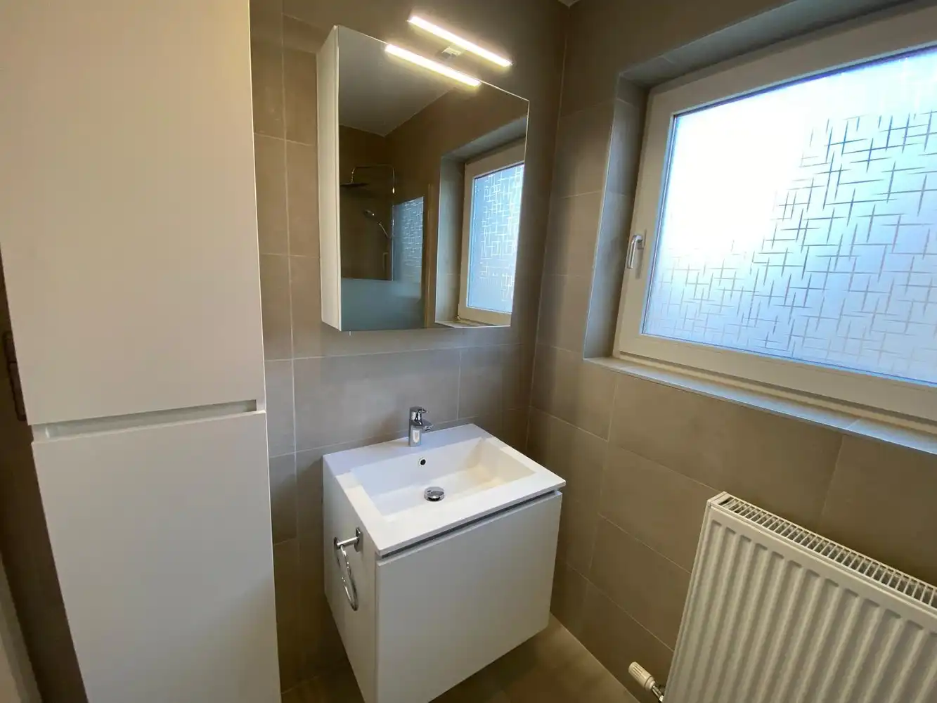 Instapklaar appartement 2de verdieping met lift. foto 16