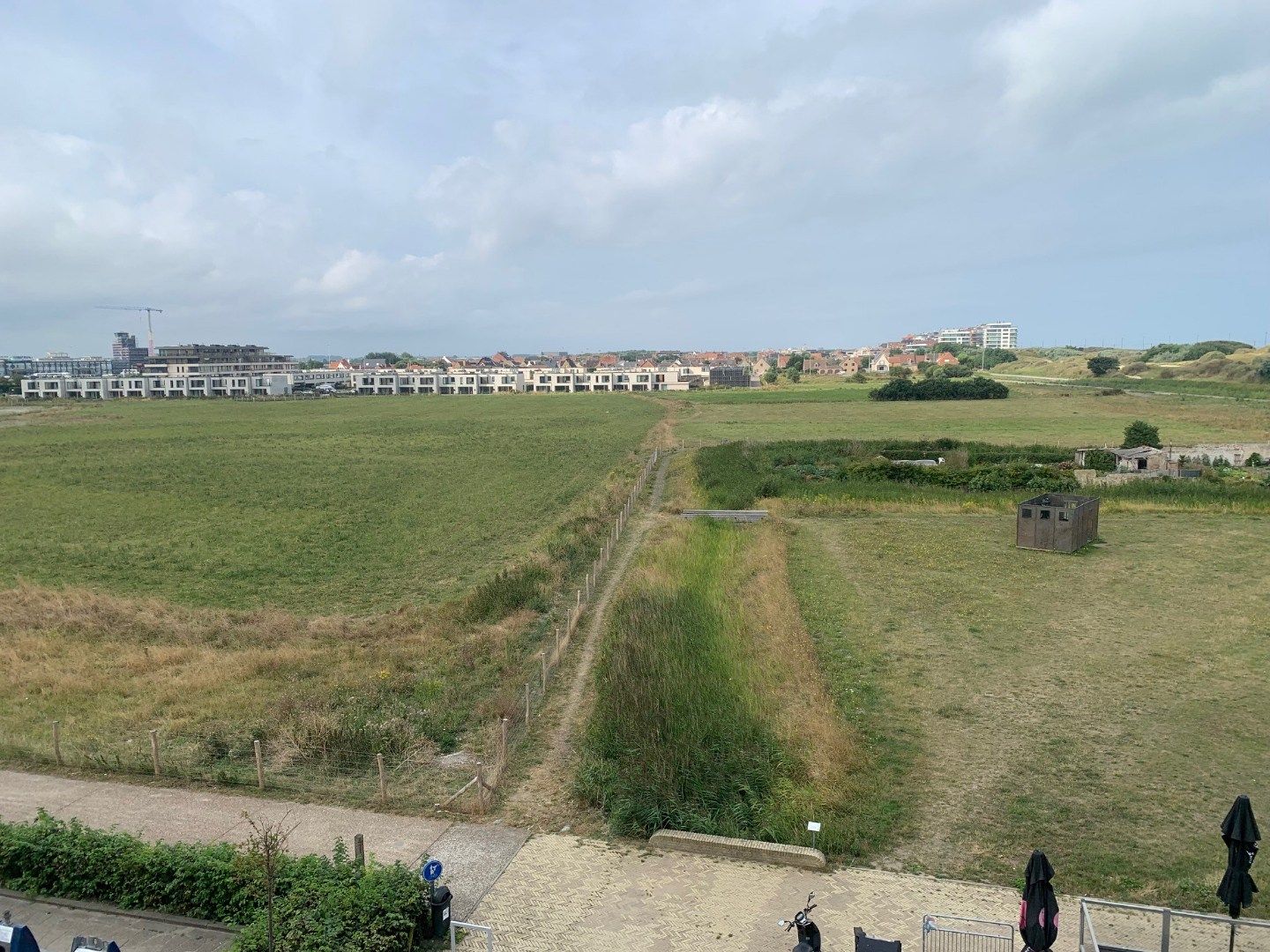 Niet gemeubelde studio met prachtig zicht op polders, strand en duinen foto 10