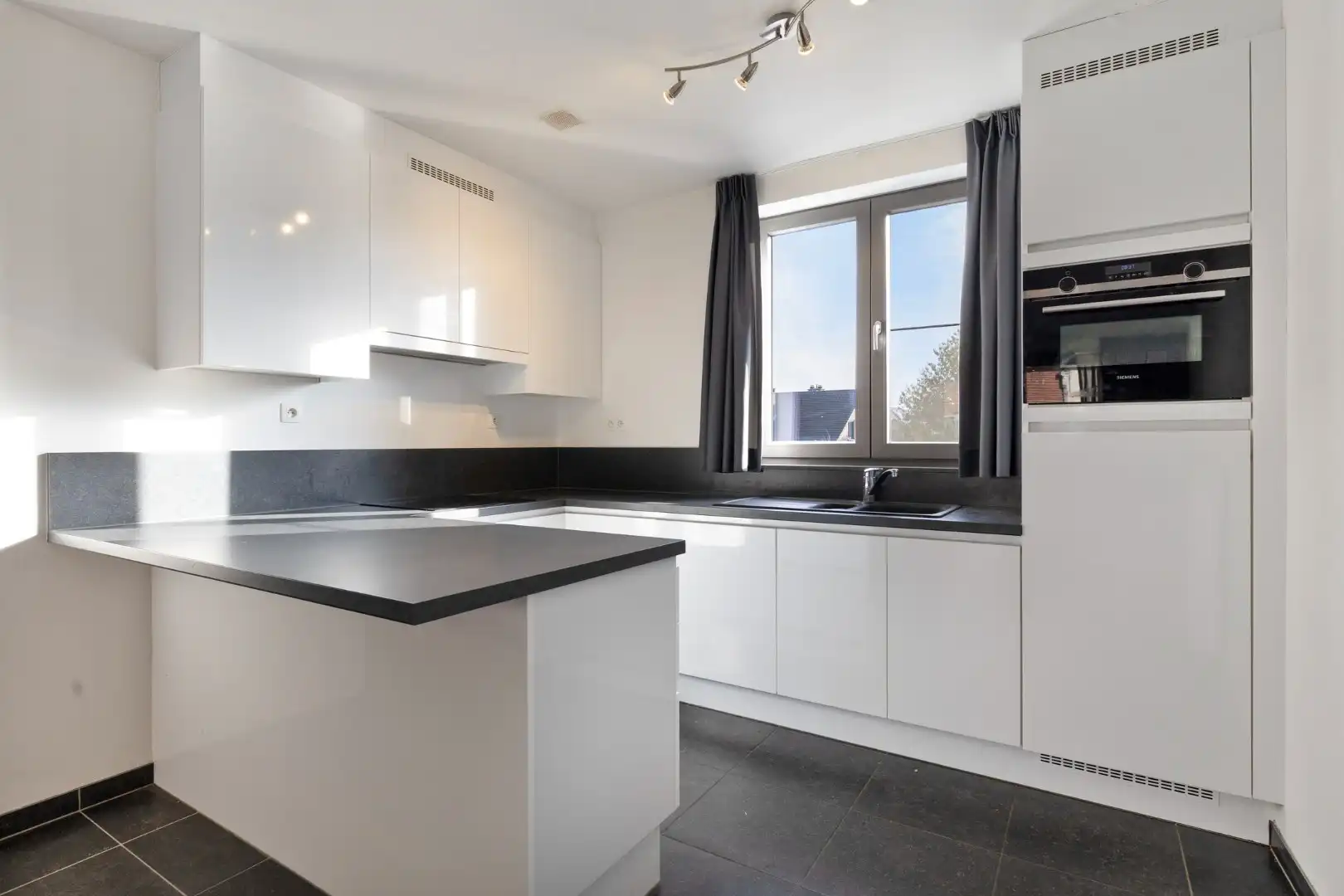 Recent appartement met 2 slaapkamers, terras, 2 ondergrondse autostaanplaatsen en private kelderberging in Herent! - EPC 41 kWh/m² - bewoonbare opp. 86 m² foto 9