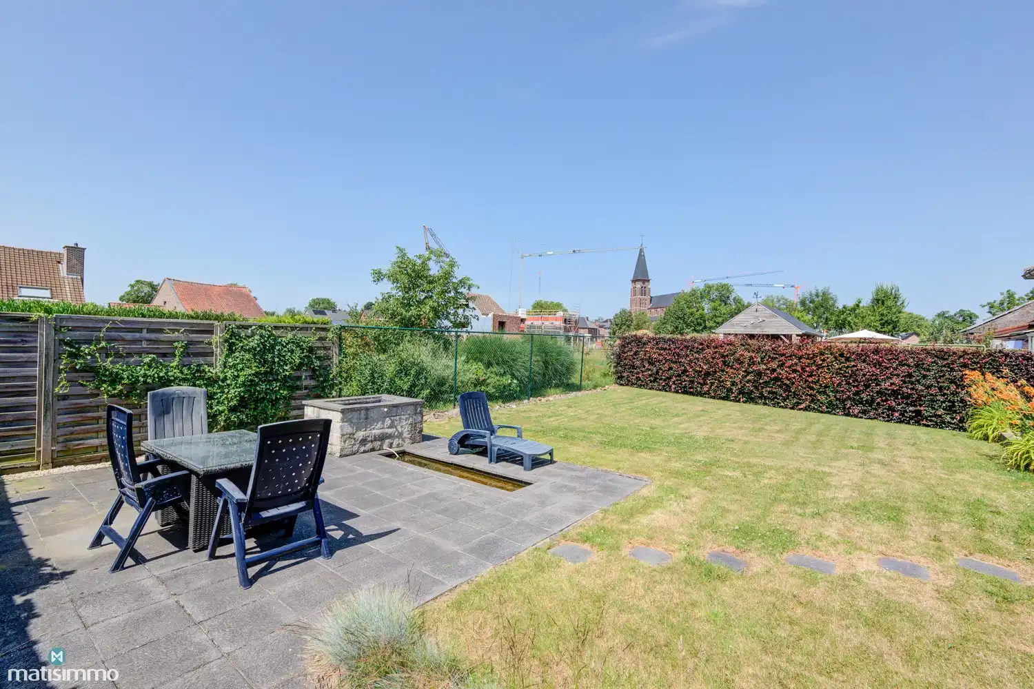 VERZORGDE EN VOLLEDIG GELIJKVLOERS INGERICHTE GEZINSWONING MET 3 SLAAPKAMERS EN TUIN IN RIEMST foto 32