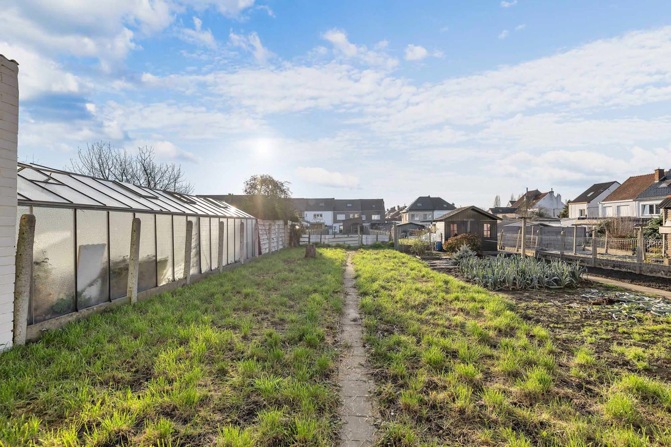Volledig gerenoveerde woning met 4 slpks en tuin foto 25