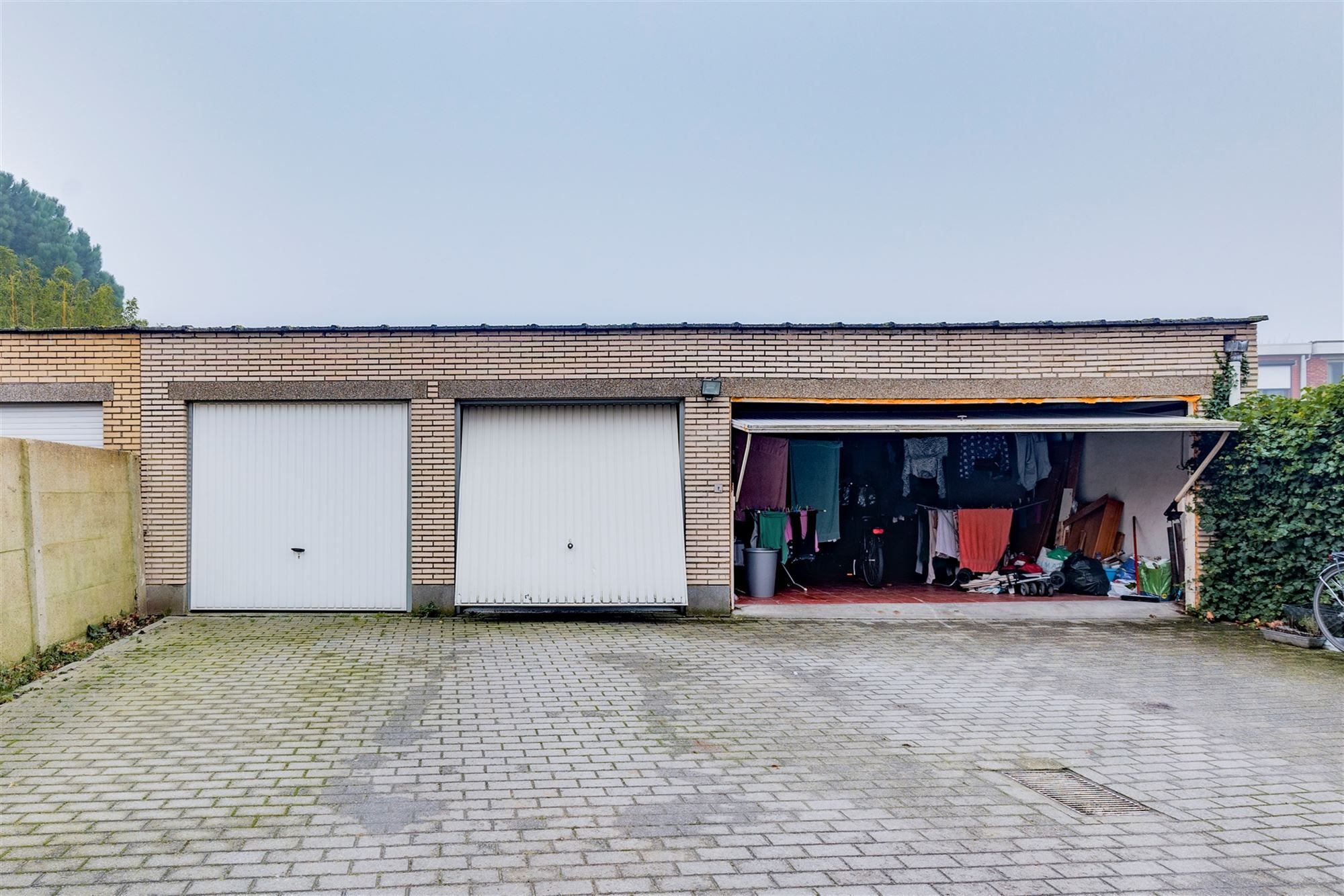 Vergund betonnen appartementsgebouw bestaande uit 3 verhuurde appartementen +  3 garageboxen in Merksem!  foto 15