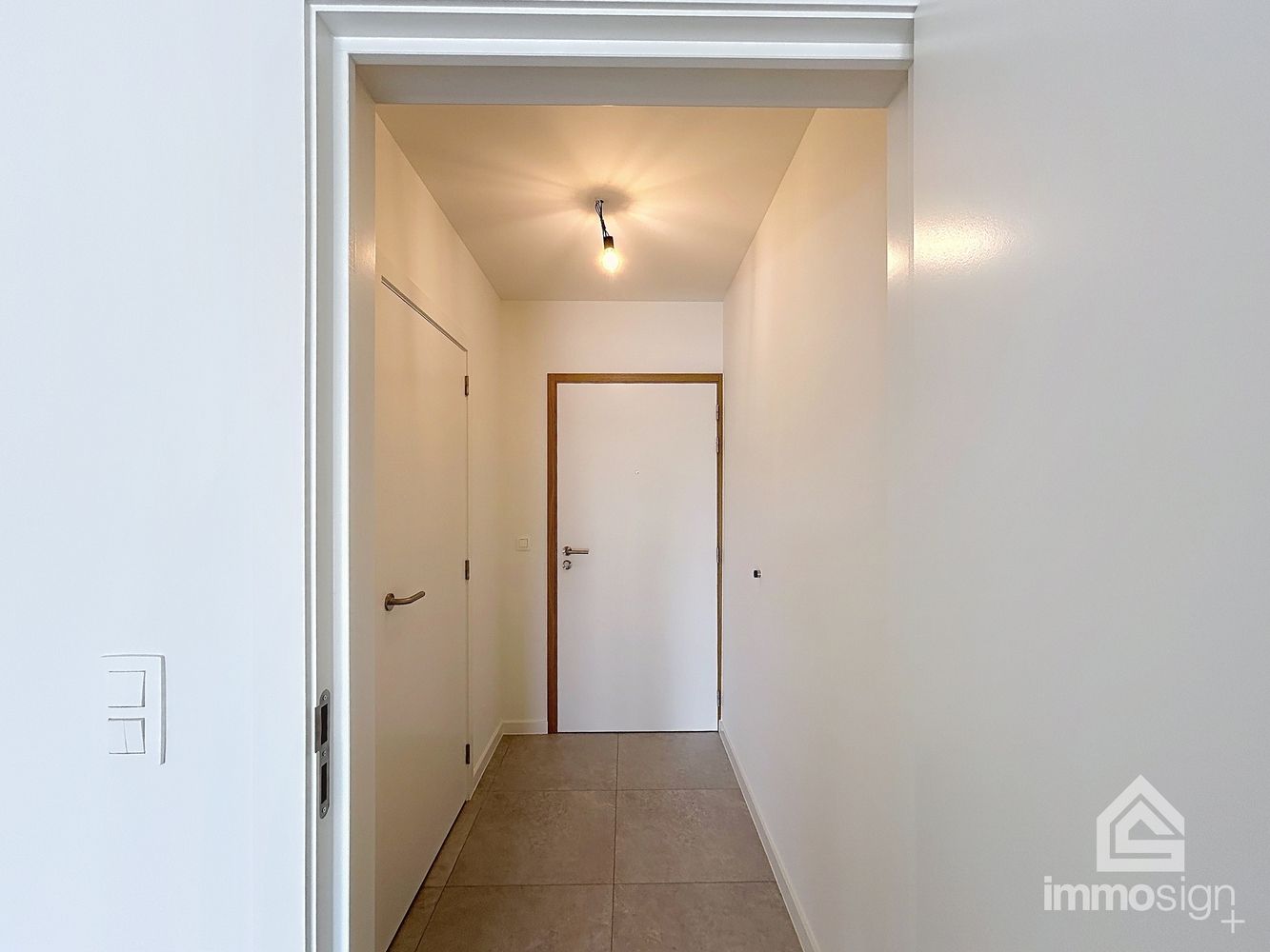 Instapklaar nieuwbouwappartement met 2 slaapkamers, terras en autostaanplaats te Kinrooi foto 15