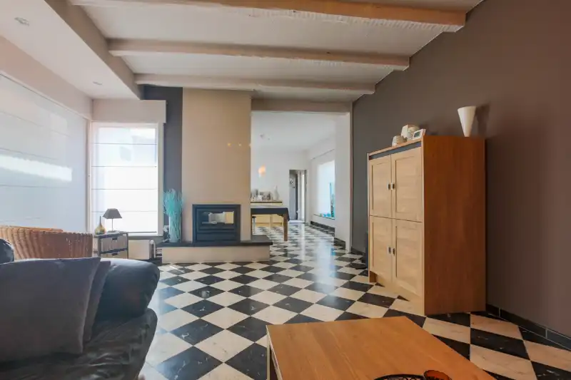 Handelspand (winkel) met woonst en magazijntje van +/- 130m². foto {{pictureIndex}}