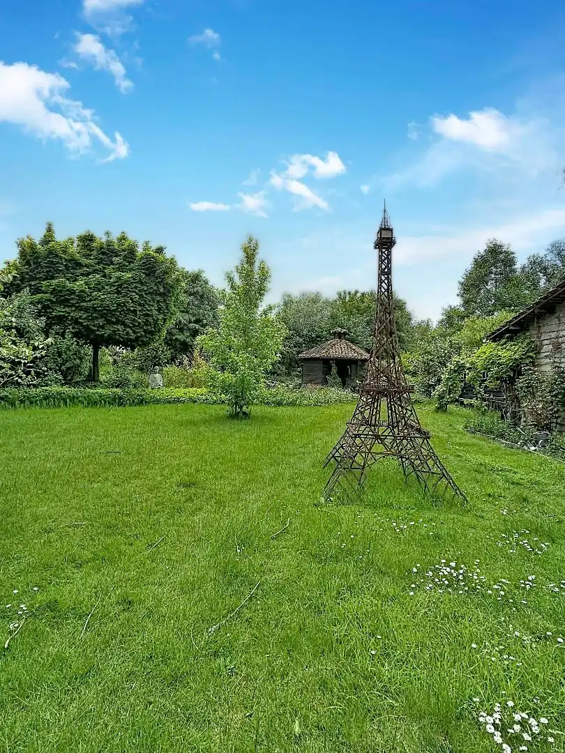 Exclusieve eigendom met handelsruimte, opbrengstappartementen en bouwgrond op toplocatie in Landen foto 23