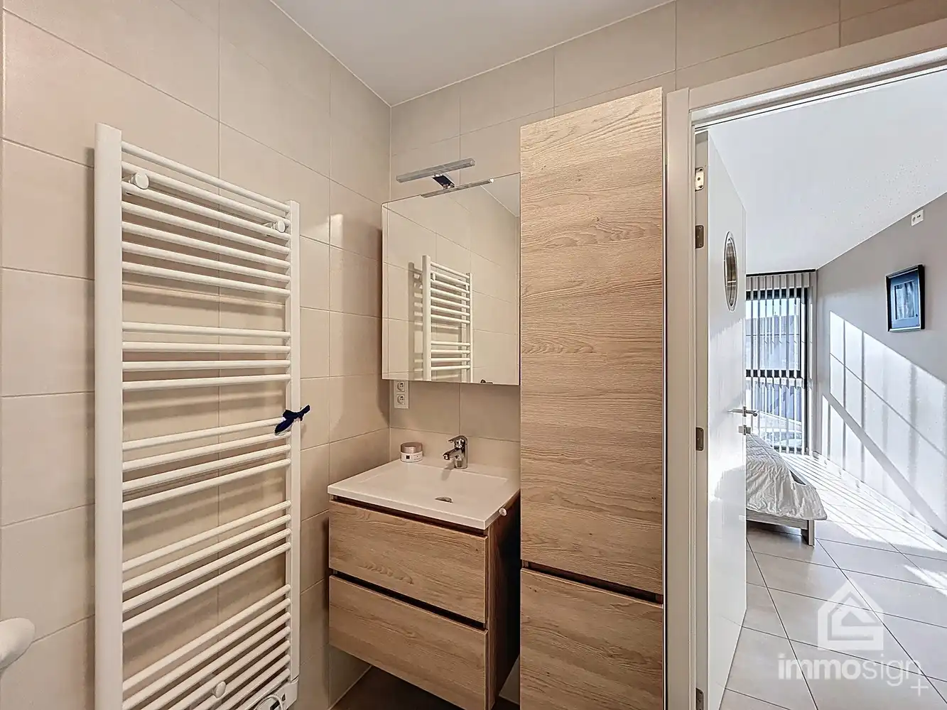 Assistentiewoning met 2 slaapkamers, terras, autostaanplaats en berging in hartje Bocholt! foto 12