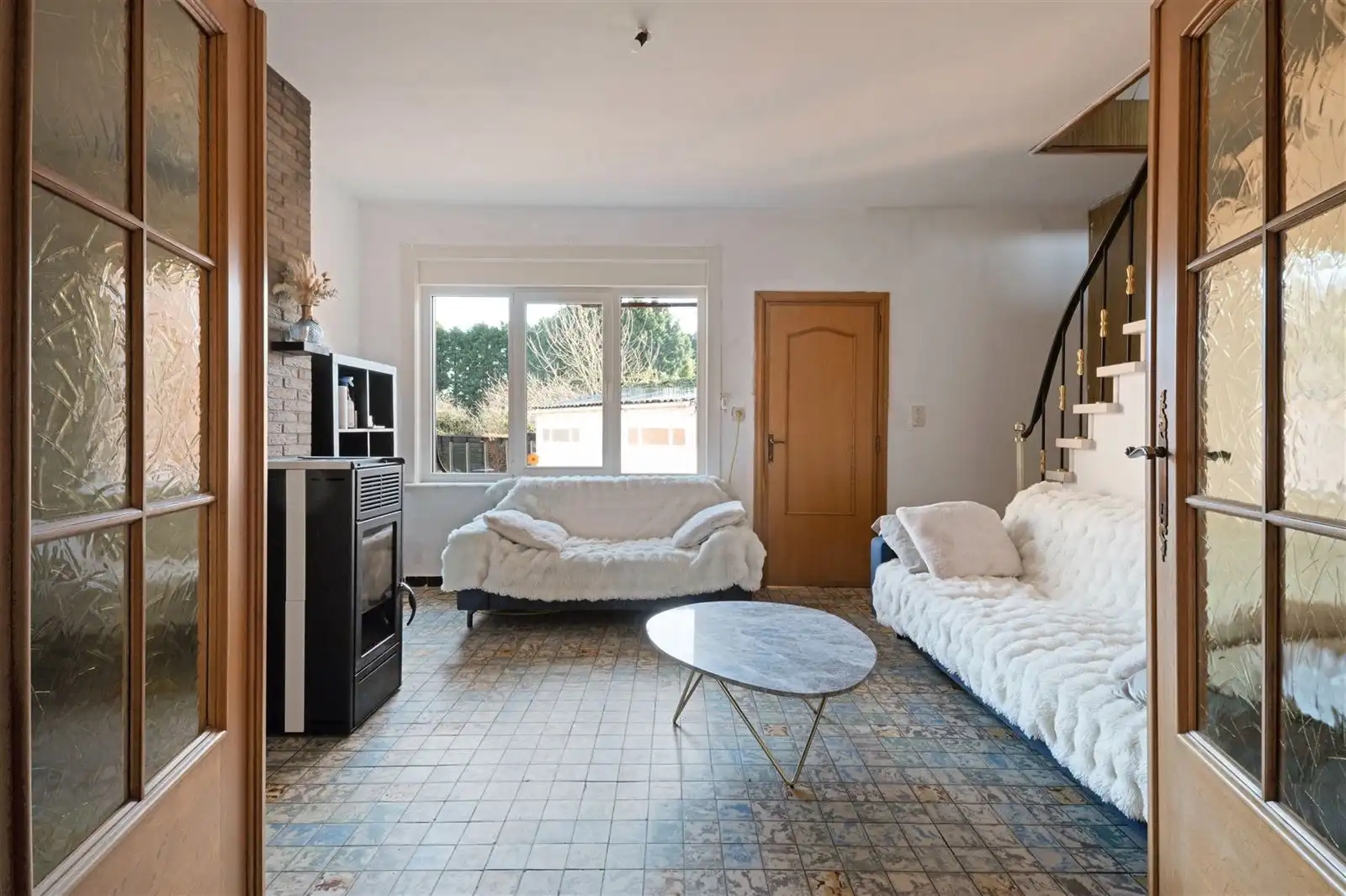 Deels te renoveren gezinswoning met garage en tuin foto 5