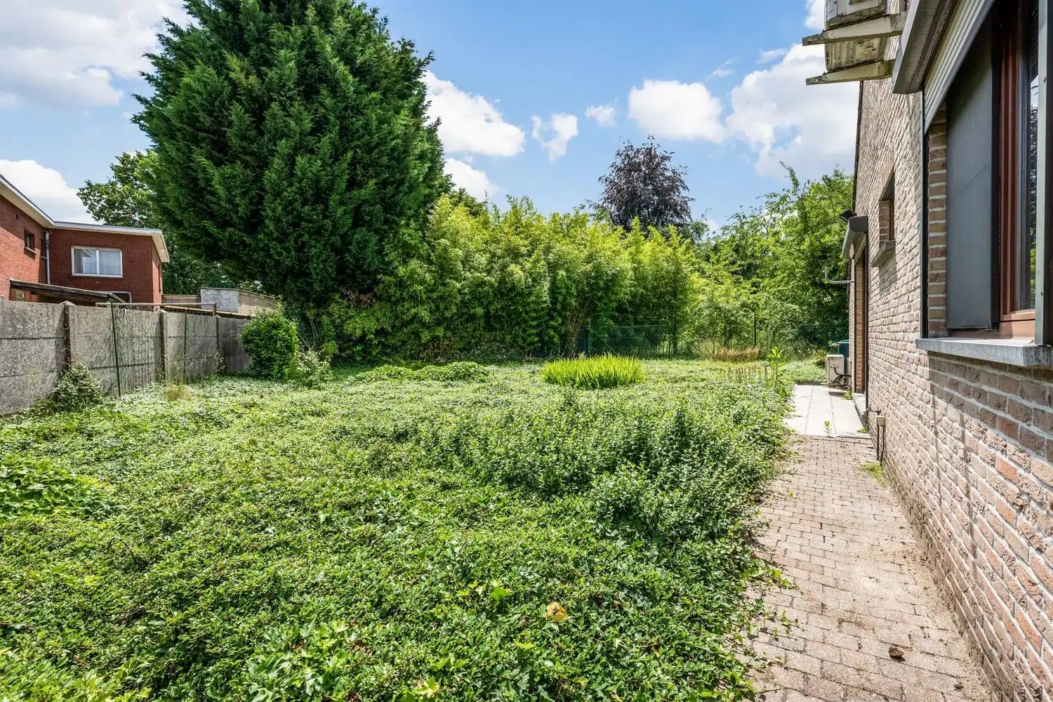 Vrijstaande laagbouwwoning met zonnige tuin en uitbreidingsmogelijkheden in Oelegem! foto 24