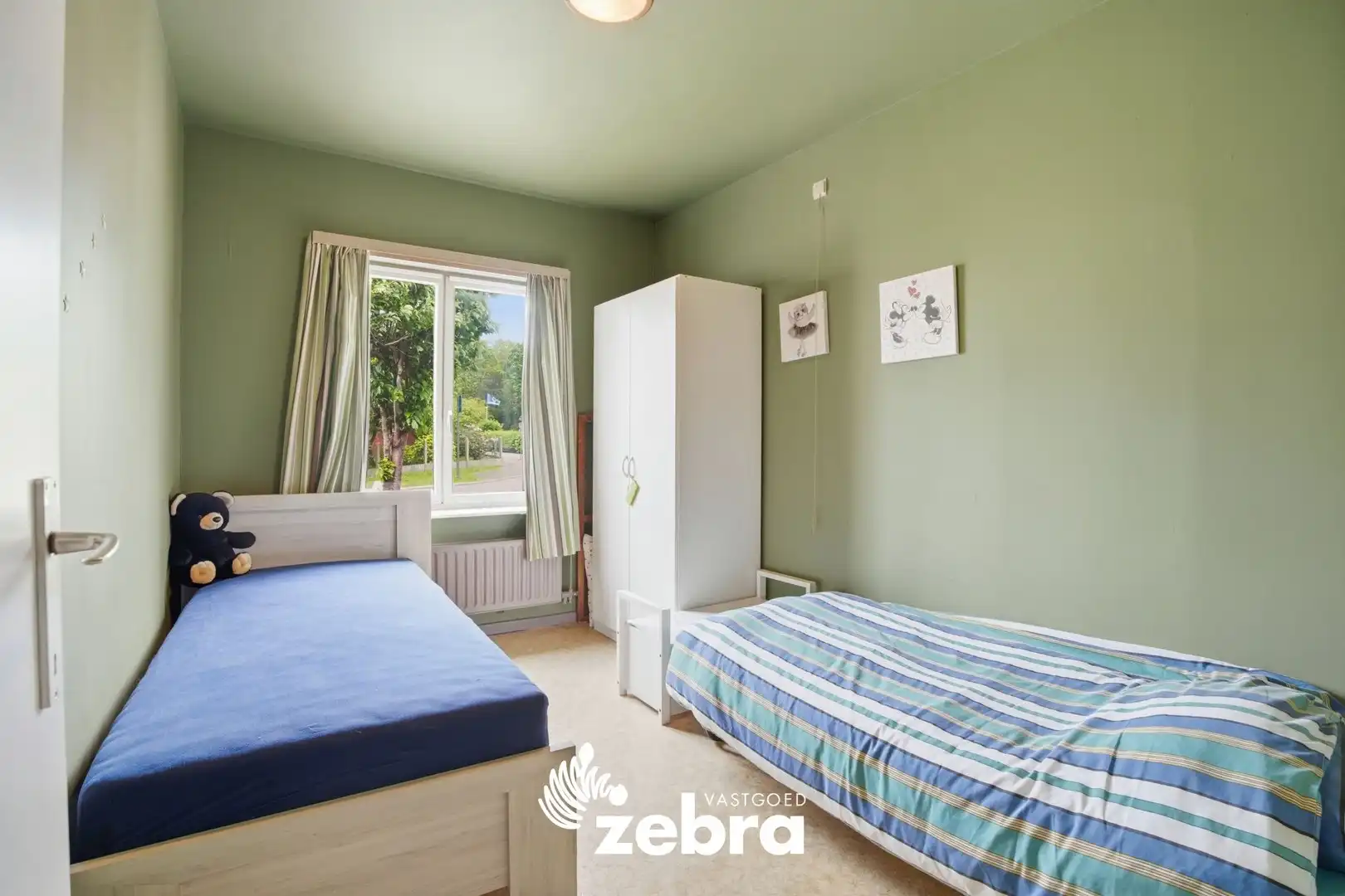 Gelijkvloerse open bebouwing met 3 slaapkamers in rustige omgeving! foto 12