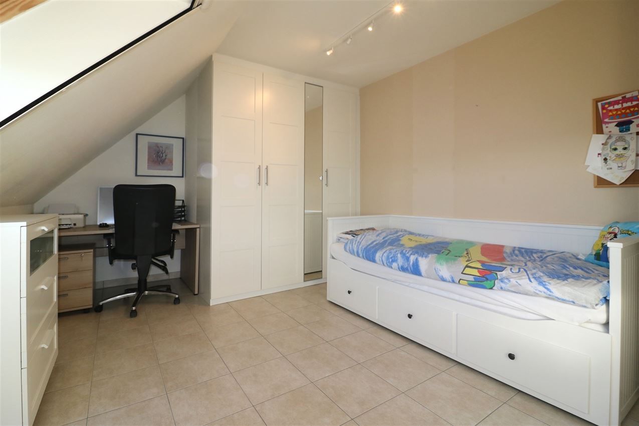 Centraal, doch rustig gelegen duplex met 2 slpk. en afgesloten garage foto 26