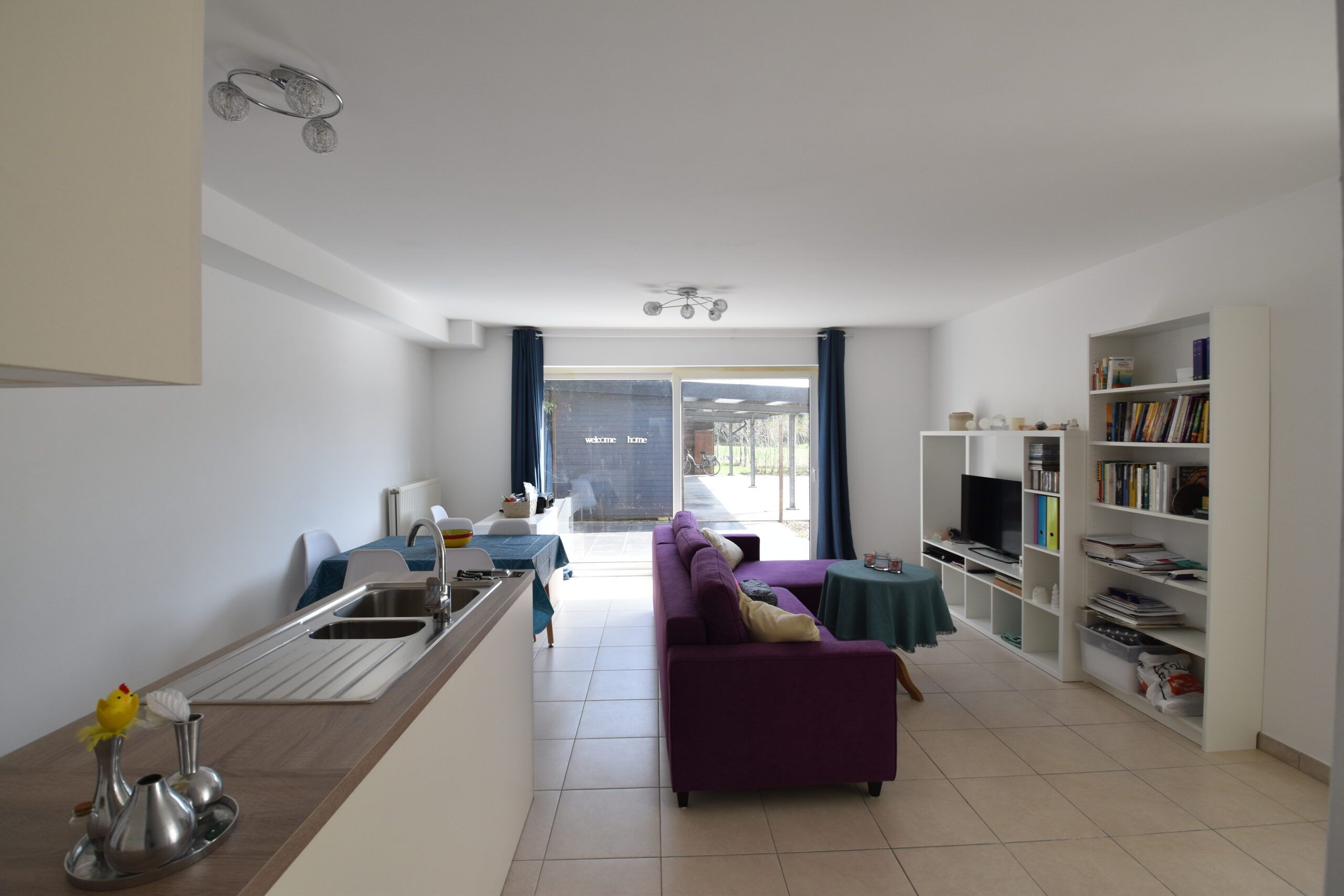 Instapklaar gelijkvloers appartement met zonnig terras en carport te huur foto 5