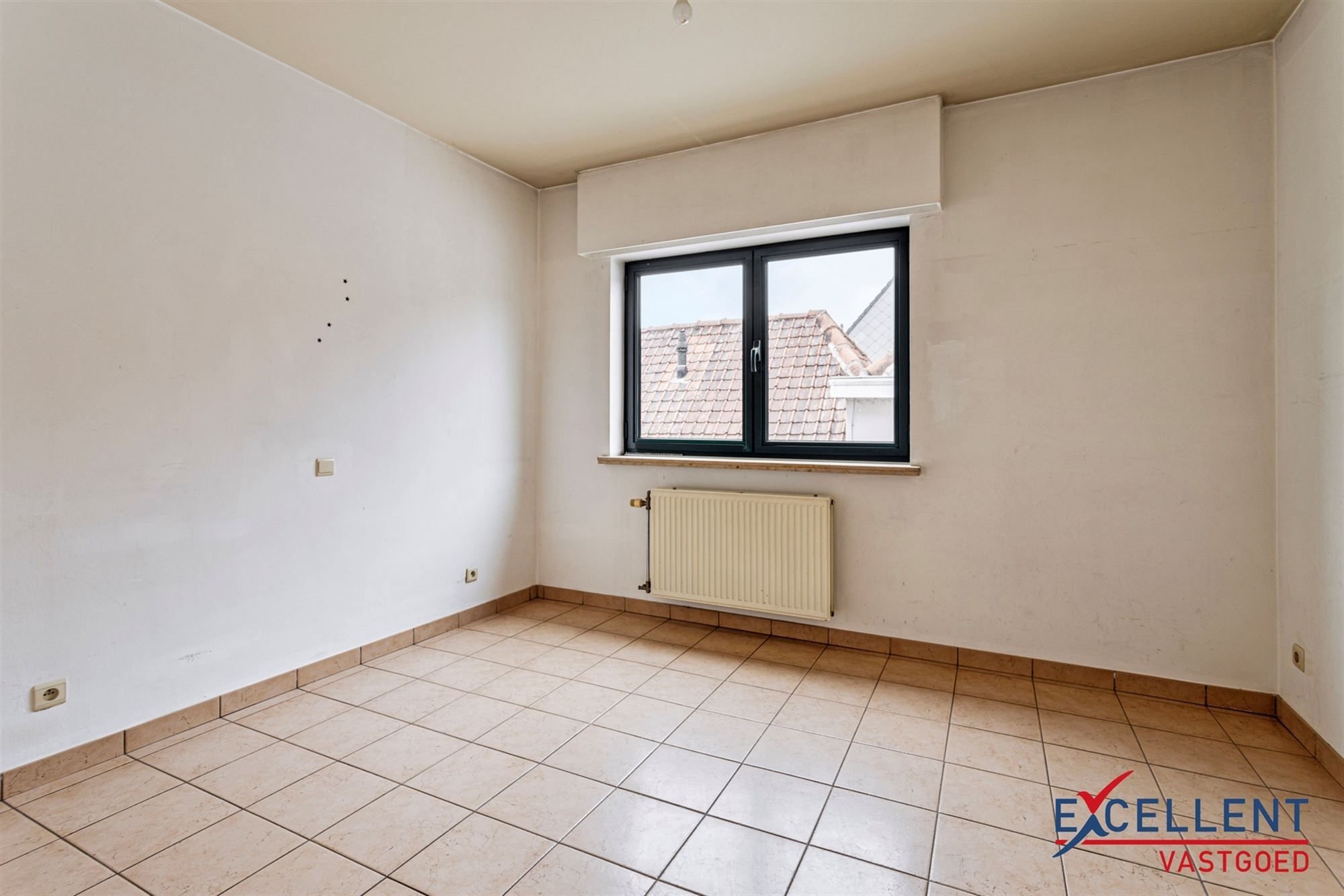 Ruim en centraal gelegen duplexappartement te koop in Deinze foto 4