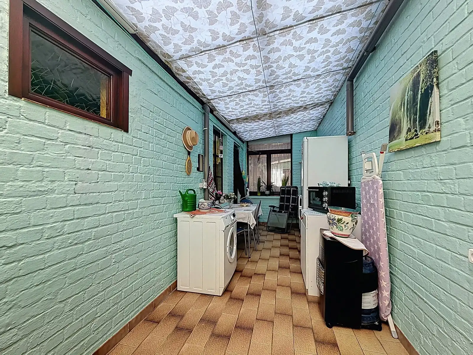 Gezellige stadswoning met 2 SLPK én zonnige tuin! foto 13