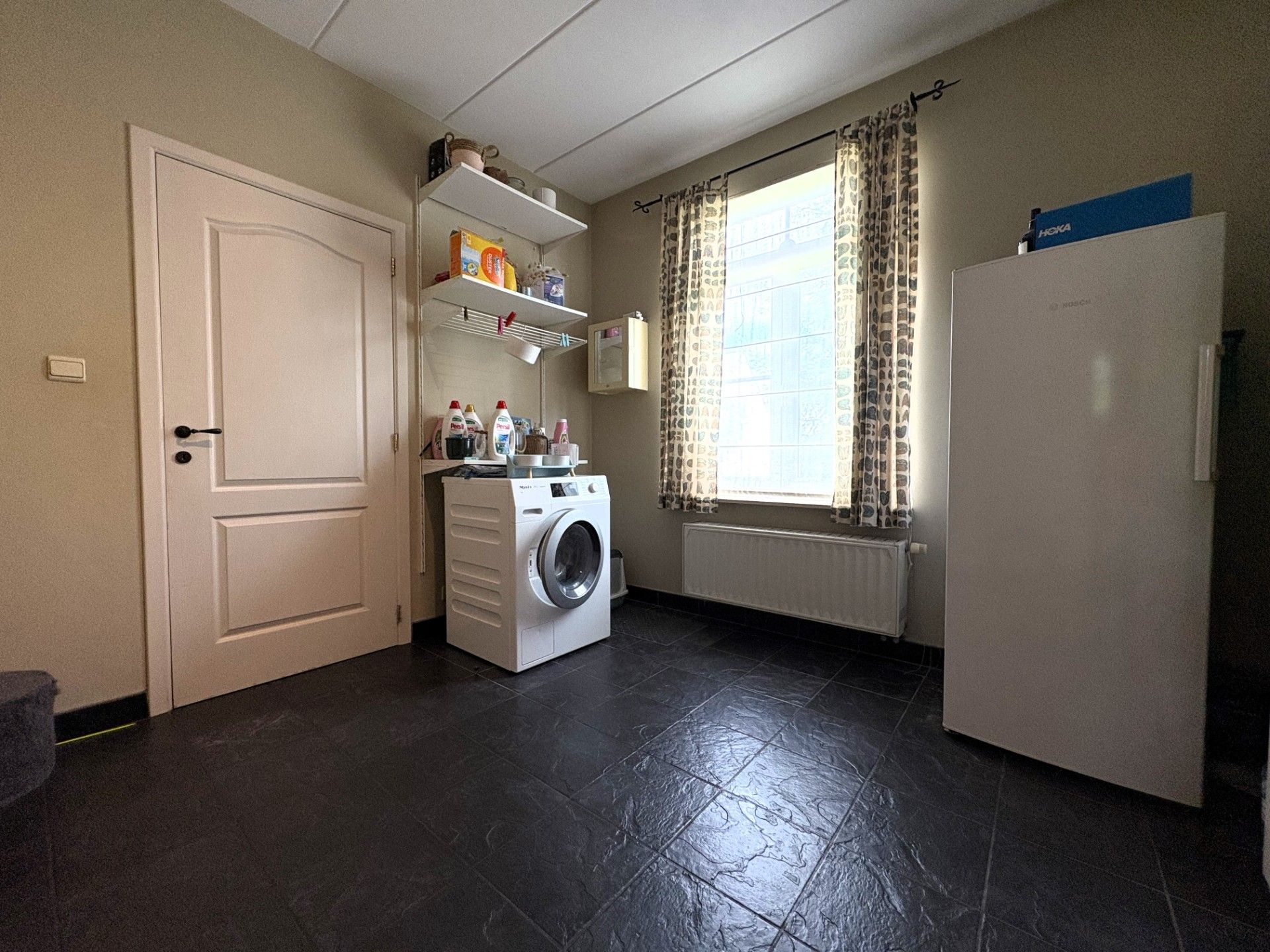 Rustig gelegen, alleenstaande woning met prachtige tuin foto 10