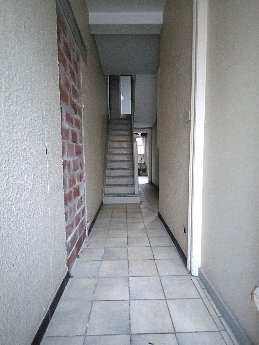 Rijwoning met 3 slaapkamers en tuin. foto 2