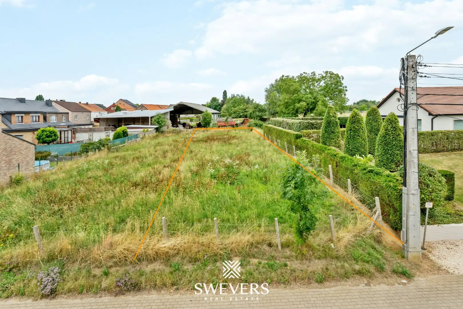Bouwgrond voor halfopen bebouwing in hartje Riemst foto 2