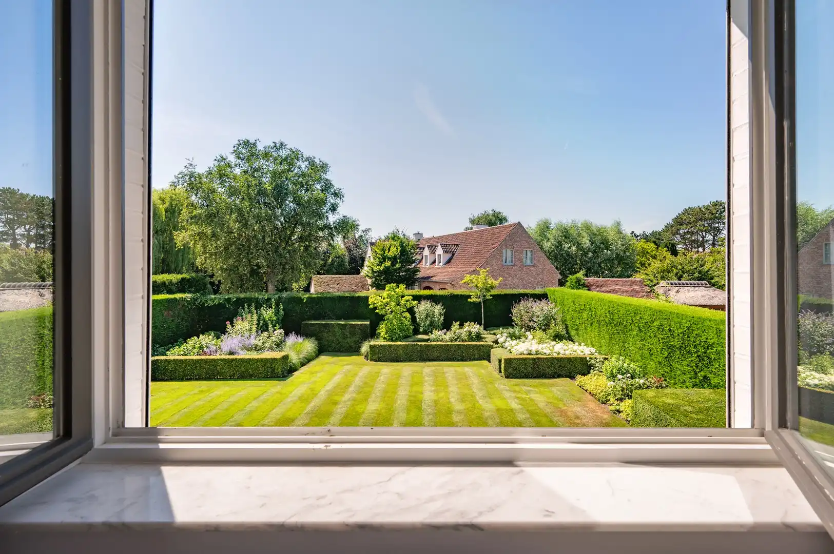 Vrijstaande villa, rustig gelegen in een aangename residentiële omgeving aan de rand van Knokke. foto 24