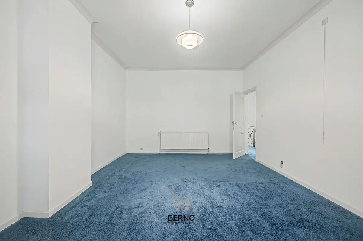 Rijwoning met ruime garage en zongerichte tuin. foto 13