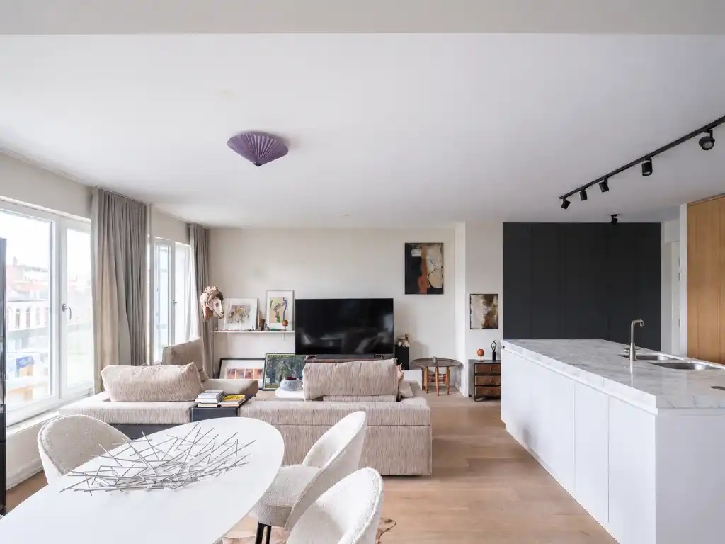 Toplocatie aan de Kouter. Wonen aan het water in een aangenaam appartement met terras. foto 6